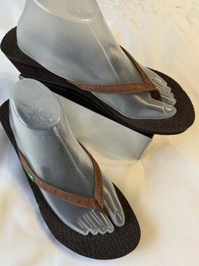 Sanuk 2 inch wedges sandals, straps are brown with silver. Size 10.5